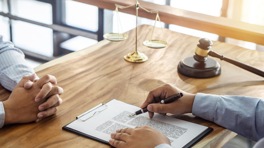 lawyer explaining document to client