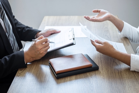 client talking with a lawyer