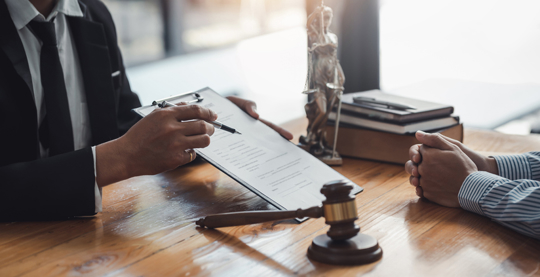 lawyer explaining document to client