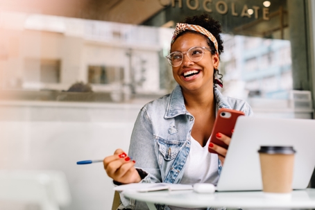 happy woman working in a coffee shop