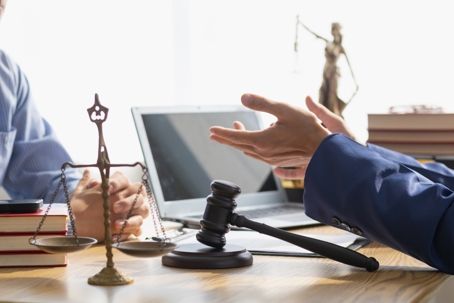 client talking with an attorney