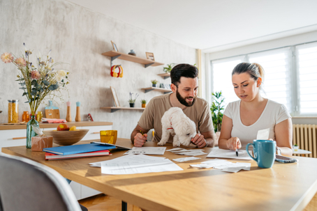 couple reviewing documents at home