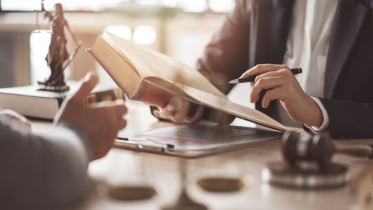 person consulting with an attorney